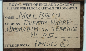 EXHIBITION LABEL IN MARY FEDDEN'S HAND