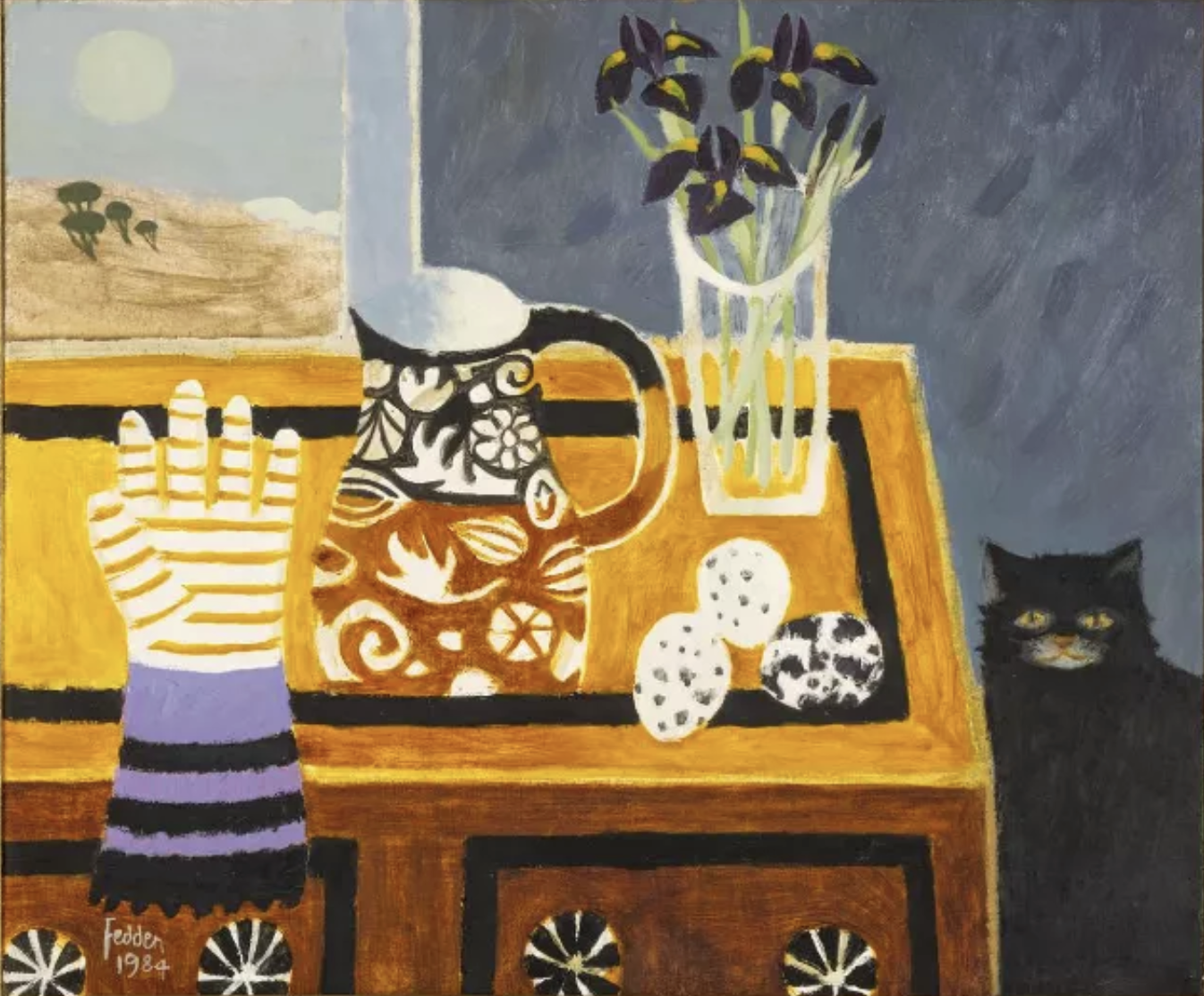 Oil painting by Mary Fedden with a black cat next to a desk, striped glove, Charlotte's glove, eggs and a bowl of irises